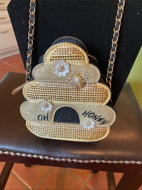 Aldo Gold Beehive Crossbody Bag with Black Accent